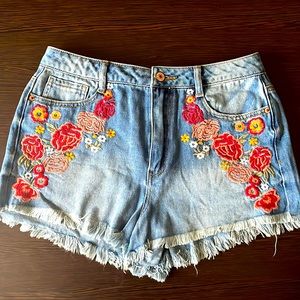 Floral embroidered jean shorts